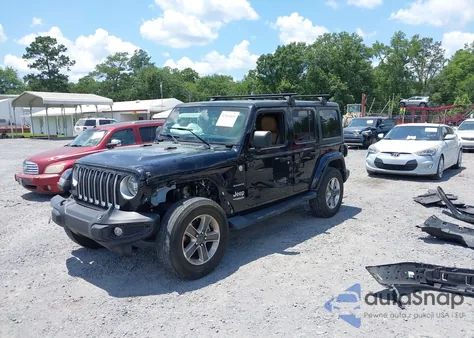 2021 Jeep Wrangler Unlimited Sahara from USA, damaged, VIN 1C4HJXEN9MW681422